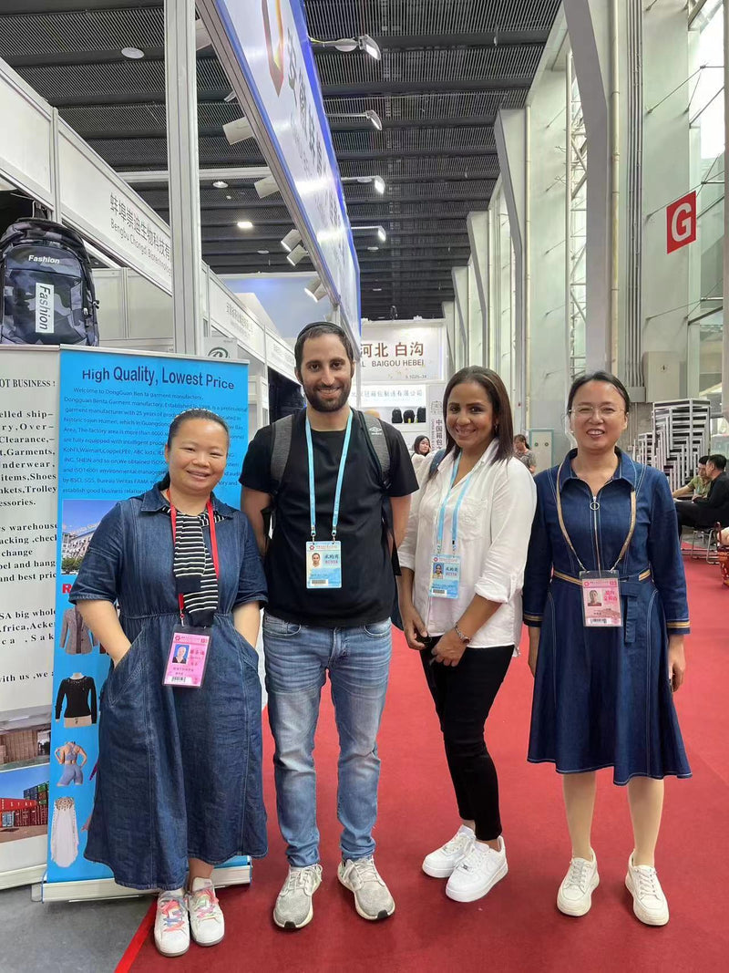 BENTA crochet knitwear factory booth photo with overseas business partners Canton Fair