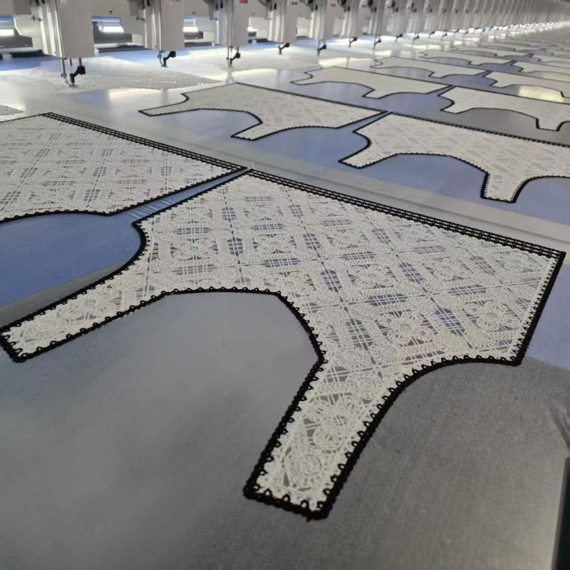 Lace hollow crochet knit cut pieces on production line inside BENTA Dongguan knitwear OEM factory workshop