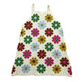 Girls crochet-style ivory sundress with multicolor daisy grid pattern and scalloped hem